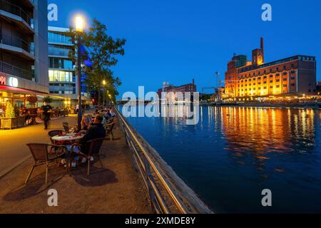 The inner harbour, in Duisburg, building Kueppersmuehle, and Werhahn-Muehle on the right, gastronomy, North Rhine-Westphalia, Germany Stock Photo