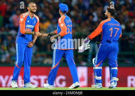 Kandy, Sri Lanka. 27th July 2024. India's Axar Patel celebrates with teammates after taking the wicket of Sri Lanka's Kusal Perera during the 1st T20I cricket match between Sri Lanka vs India at the Pallekele International Cricket Stadium in Kandy on 27th July, 2024. Viraj Kothalwala/Alamy Live News Stock Photo