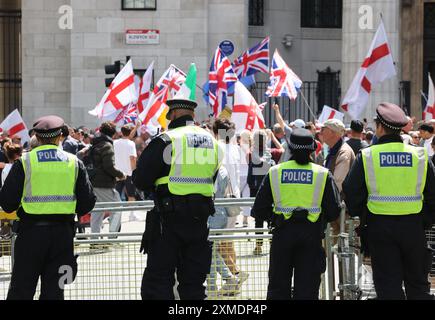 London, UK 27th July 2024. 1000 extra police were drafted in to manage and keep part the opposing demonstrations in central London. Tommy Robinson led his Take Our Country Back march from the Royal Courts of Justice to Trafalgar Square. The Stand Up to Racism march went from Russell Square to Whitehall. Credit : Monica Wells/Alamy Live News Stock Photo