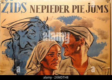 An anti-semitic poster from Nazi occupied Latvia during WW2. The text reads 'Jews do not belong to you' or, more colloquially, 'Jews do not belong here' Stock Photo