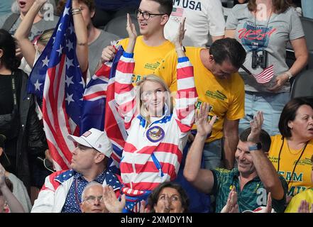 Paris, France. 27th July, 2024. Spectators cheer for Team USA at the swimming competition at the Paris 2024 Olympic Games in Paris, France, on Saturday, July 27, 2024. Photo by Richard Ellis/UPI. Credit: UPI/Alamy Live News Stock Photo