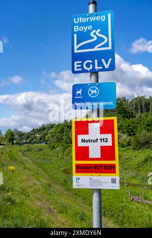 Riverside path along the Boye, emergency board, with location designation, stream, runs for 13.8 km through the towns of Gladbeck, Bottrop (photo) Stock Photo