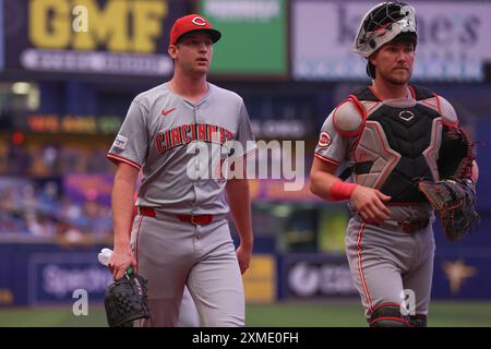 St. Petersburg, FL: Cincinnati Reds pitcher Nick Lodolo (40) and catcher Tyler Stephenson (37) walk to the dugout prior to an MLB game against the Tam Stock Photo