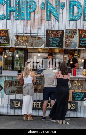 young people at a fast food takeaway wagon trailer Stock Photo