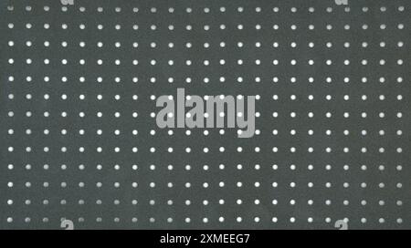 perforated metal sheet plate useful as a background Stock Photo
