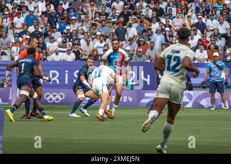French rugby player Antoine Dupont, left, and former judo star Teddy ...