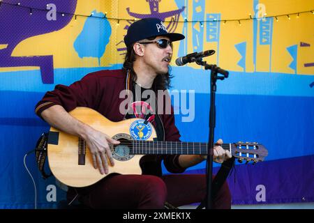 Malmesbury, UK. 27th July, 2024. Eugene Hütz performs at Radio WOMAD during Womad - World of Music, Arts and Dance 2024. Eugene Hütz is a Ukrainian-born singer, composer, disc jockey and actor, most notable as the frontman of the Gypsy punk band Gogol Bordello. Picture by Julie Edwards./Alamy Live News Stock Photo