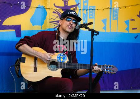 Malmesbury, UK. 27th July, 2024. Eugene Hütz performs at Radio WOMAD during Womad - World of Music, Arts and Dance 2024. Eugene Hütz is a Ukrainian-born singer, composer, disc jockey and actor, most notable as the frontman of the Gypsy punk band Gogol Bordello. Picture by Julie Edwards./Alamy Live News Stock Photo