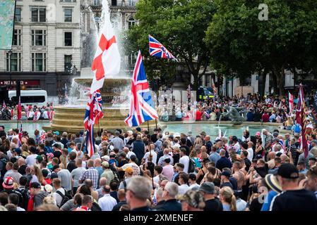 Thousands of demonstrators at the rally organised by Tommy Robinson, a far right activist, at Trafalgar Square, London, UK, 27/07/2024 Stock Photo