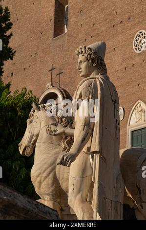 Marble statue of the divine twins Castor and Pollux, Dioscuri, placed on the balustrade of Piazza del Campidoglio in Rome, Italy Stock Photo