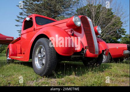 Hilton Beach, Ontario, Canada - July 27, 2024: Red 1937 Dodge Pick Up Truck at Classic Car Show low angle view front end Stock Photo