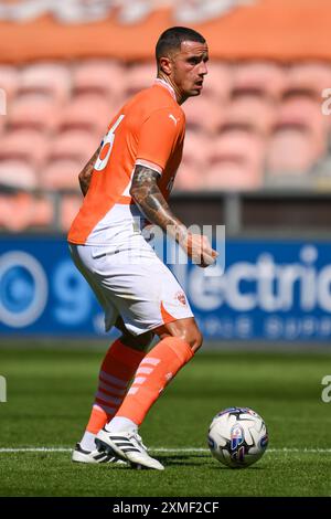 Oliver Norburn of Blackpool in action during the Pre-season friendly match Blackpool vs Sunderland at Bloomfield Road, Blackpool, United Kingdom, 27th July 2024  (Photo by Craig Thomas/News Images) Stock Photo