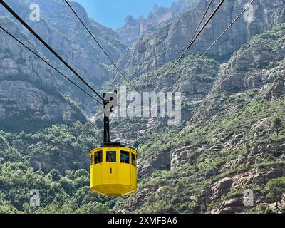 A cable car descends from the Santa Maria de Montserrat Abbey in Catalonia, Spain. Stock Photo