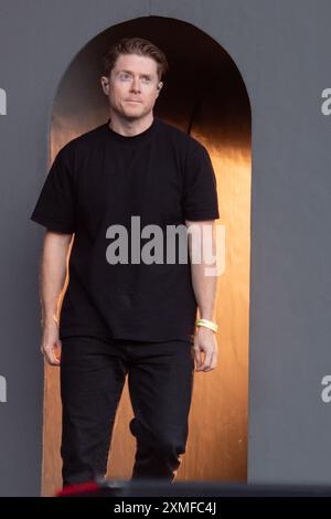 London, UK. 27 Jul 2024. Bassist William Cashion of American synth-pop band Future Islands headlines The South Facing Festival at Crystal Palace Bowl. Credit: Justin Ng/Alamy Live News Stock Photo