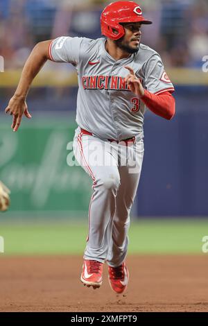 St. Petersburg, Florida, USA. 26th July, 2024. Cincinnati Reds third base Jeimer Candelario (3) runs to third base on a ground ball force out by catcher Tyler Stephenson (37) in the top of the tenth inning during an MLB game against the Tampa Bay Rays on July 26, 2024 at Tropicana Field. The Reds beat the Rays 3-2 in ten innings. (Credit Image: © Kim Hukari/ZUMA Press Wire) EDITORIAL USAGE ONLY! Not for Commercial USAGE! Stock Photo