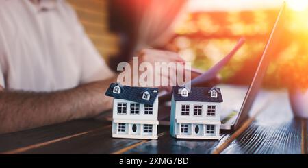 Businessman uses laptop with cybersecurity technology to protect personal data. Cybersecurity and privacy concepts for data protection. Stock Photo