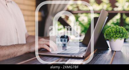Businessman uses laptop with cybersecurity technology to protect personal data. Cybersecurity and privacy concepts Stock Photo