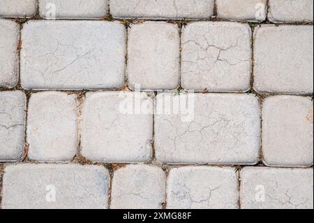 texture of white stone paving slabs on sidewalk close up Stock Photo