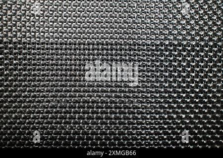 chrome mesh texture background of combo amplifier Stock Photo