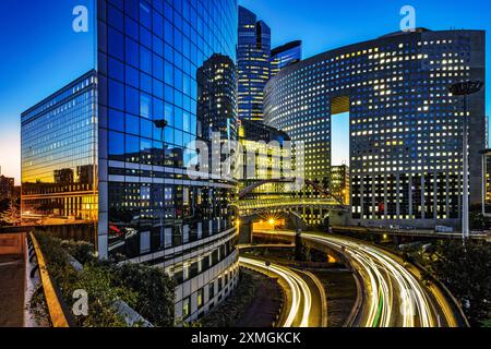 France. Hauts-de Seine (92) Puteaux. La Défense district. Traffic at the foot of the Kupka, Société Générale and Pacific towers. Stock Photo