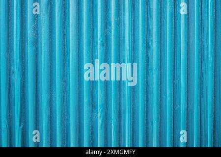 Solid texture of a green wooden wall in full screen as a background Stock Photo
