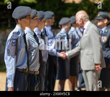 King Charles III meets cadets from 42F (King's Lynn, Estate 1939) Squadron Air Training Corps Venture Adventure, after attending a Sunday church service at St Mary Magdalene Church in Sandringham, Norfolk. Picture date: Sunday July 28, 2024. Stock Photo