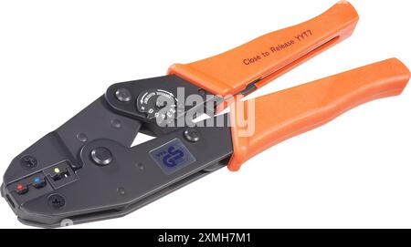 Universal crimping and stripping pliers with orange  handles, isolated on white background Stock Photo