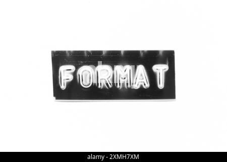 Black color banner that have embossed letter with word format on white paper background Stock Photo