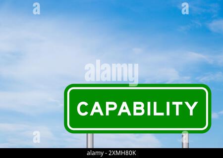 Green color transportation sign with word capability on blue sky with white cloud background Stock Photo
