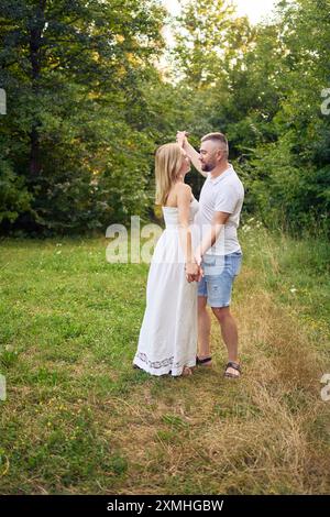 30-year-old couple in love in the garden Stock Photo