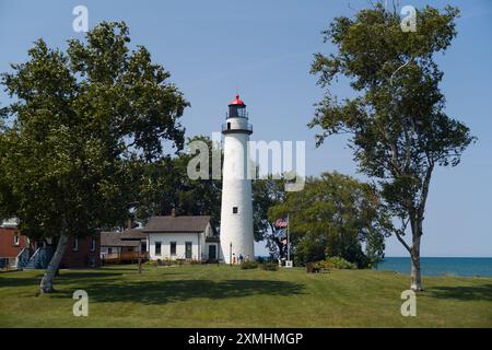 The Pointe aux Barques Lighthouse and museum, on Lake Michigan, in Port Hope Michigan USA Stock Photo