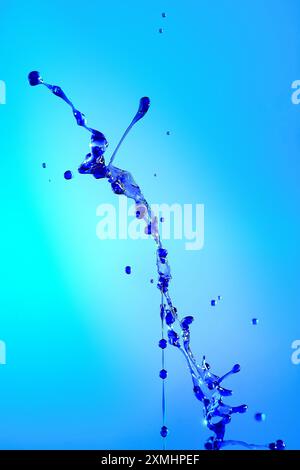 Splashes of red liquid isolated on black background template Stock Photo
