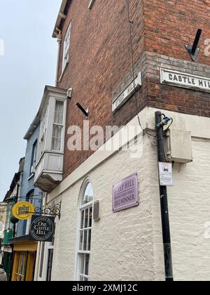 Street name signs at the top of Steep Hill where it meets Castle Hill, in the historic old town city of Lincoln near to the Castle and Cathedral. Stock Photo