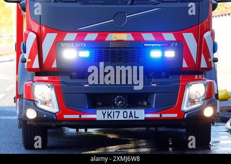 A Volvo fire engine pump in use by West Yorkshire Fire & Rescue at a building fire in Leeds. Stock Photo