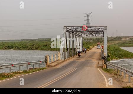 KATUNGURU, UGANDA - MARCH 16, 2020: View of Kazinga Channel Bridge in Katunguru village, Uganda Stock Photo