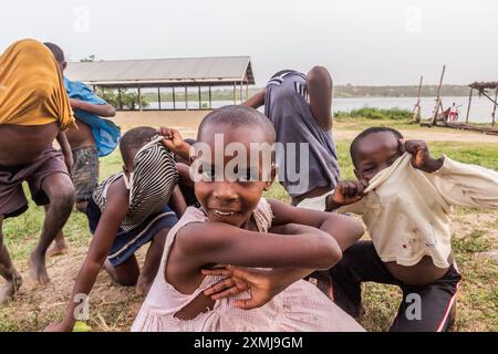 KATUNGURU, UGANDA - MARCH 16, 2020: Local children in Katunguru village, Uganda Stock Photo