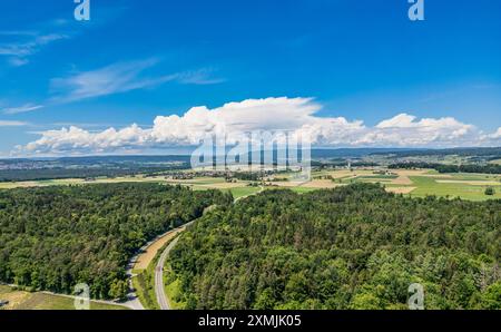 Marthalen, Switzerland, 20th May 2024: View towards southern Germany and the canton of Schaffhausen where a storm is raging. The sun is now shining in Stock Photo