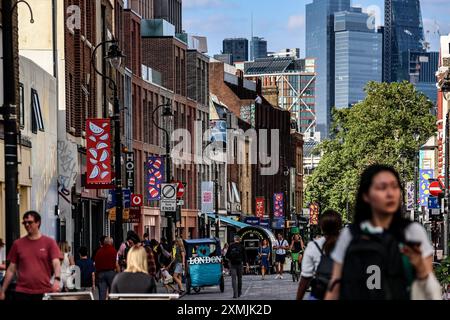 London, UK. 18th July, 2024. People walk along Lower Marsh Street in central London in front of skyscrapers. (Credit Image: © Dominika Zarzycka/SOPA Images via ZUMA Press Wire) EDITORIAL USAGE ONLY! Not for Commercial USAGE! Stock Photo