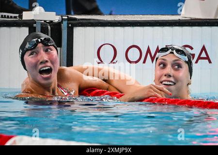 Nanterre, France. 28th July, 2024. HUSKE Torri of United States and WALSH Gretchen of United States celebrate during the Swimming, WOMEN'S 100M BUTTERFLY FINAL, Olympic Games Paris 2024 on 28 July 2024 at Paris La Defense Arena in Nanterre, France - Photo Matthieu Mirville/DPPI Media/Panoramic Credit: DPPI Media/Alamy Live News Stock Photo