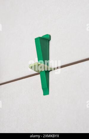 Tile leveling system with plastic clips and wedges Stock Photo