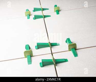 Tile leveling system with plastic clips and wedges Stock Photo
