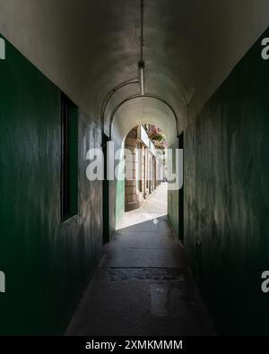 28 July 2024. High Street,Forres,Moray,Scotland. This is the Tunnel that runs underneath the Tolbooth at High Street in Forres. This is showing thge s Stock Photo