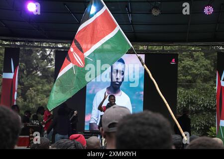 Nakuru, Kenya. 28th July, 2024. An image of Austin Onyisa Makhoha, 17, who died at the hands of law enforcement during the tax hike and anti-government demonstrations held across the country in June and July, is displayed on a screen during a memorial concert. The police have been accused for the disappearances and the deaths of over 60 demonstrators who gathered in large numbers to protest against tax increases and poor governance. Credit: SOPA Images Limited/Ģ����ý Live News Stock Photo