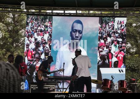 Nakuru, Kenya. 28th July, 2024. An image of Austin Onyisa Makhoha, 17, who died at the hands of law enforcement during the tax hike and anti-government demonstrations held across the country in June and July, is displayed on a screen during a memorial concert. The police have been accused for the disappearances and the deaths of over 60 demonstrators who gathered in large numbers to protest against tax increases and poor governance. (Photo by James Wakibia/SOPA Images/Sipa USA) Credit: Sipa USA/Ģ����ý Live News Stock Photo