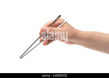 man hand holding chopsticks isolated on white background Stock Photo