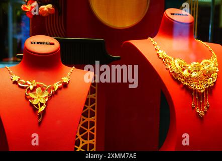 YICHANG, CHINA - JULY 28, 2024 - Gold jewelry displayed at a gold jewelry store in Yichang, Hubei province, China, July 28, 2024. In the first half of Stock Photo