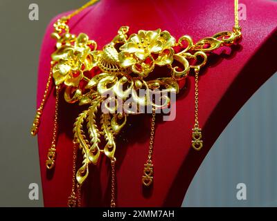 YICHANG, CHINA - JULY 28, 2024 - Gold jewelry displayed at a gold jewelry store in Yichang, Hubei province, China, July 28, 2024. In the first half of Stock Photo