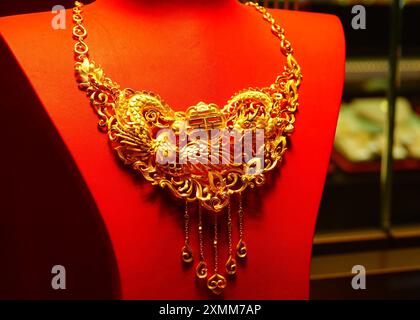 YICHANG, CHINA - JULY 28, 2024 - Gold jewelry displayed at a gold jewelry store in Yichang, Hubei province, China, July 28, 2024. In the first half of Stock Photo