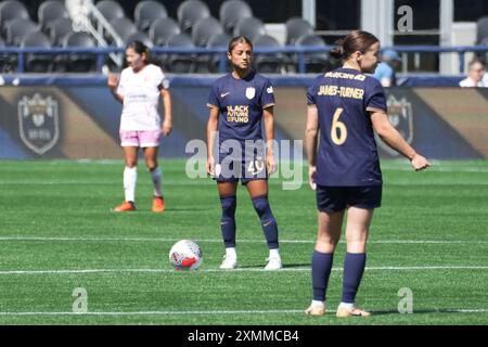 Seattle Reign FC midfielder Angharad James-Turner (8) falls against NJ ...