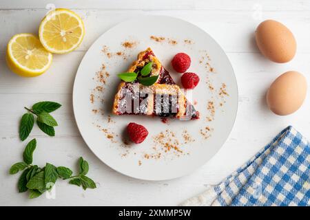 Delicious Italian crostata filled with red fruit jam. Stock Photo